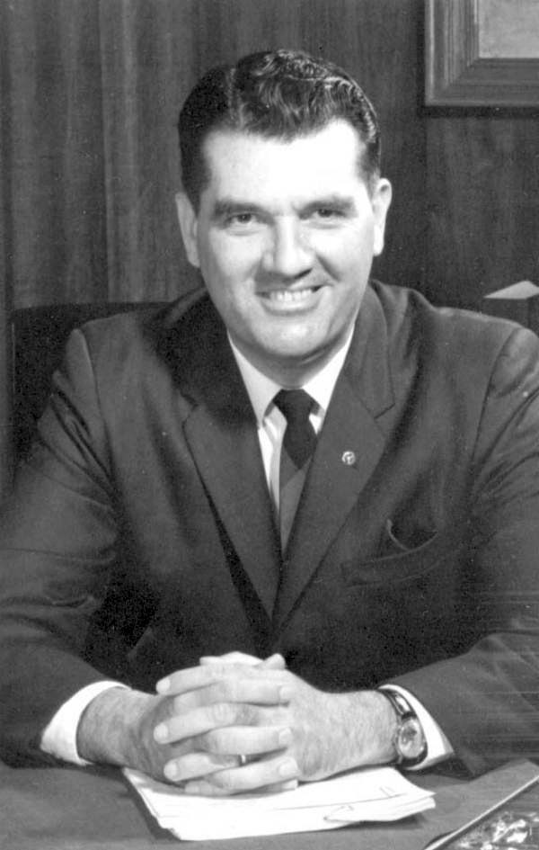 John E. Champion.