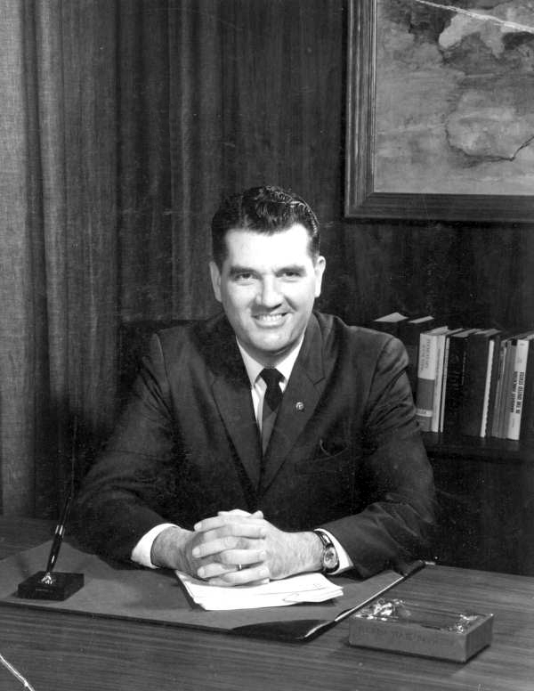 John E. Champion.