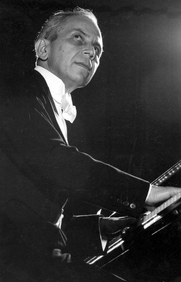 Florida State University music professor Edward Kilenyi playing the piano