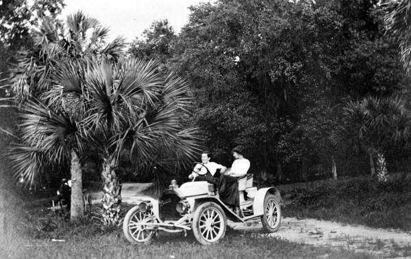 Couple in a Buick automobile