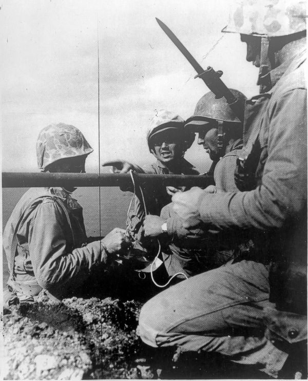 Members of 40 man patrol planting first American flag at Iwo Jima