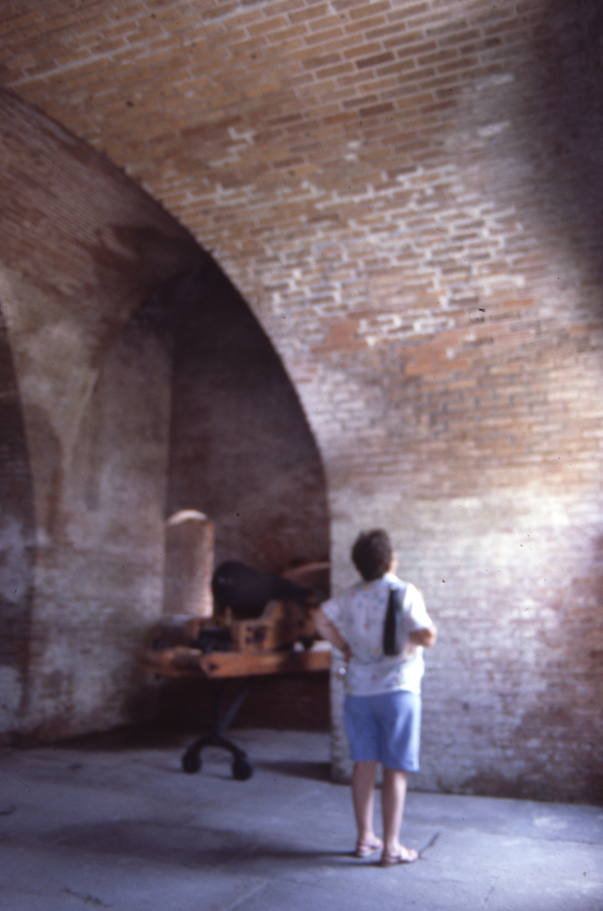 Woman looking at a wall inside Fort Clinch - Fernandina Beach, Florida