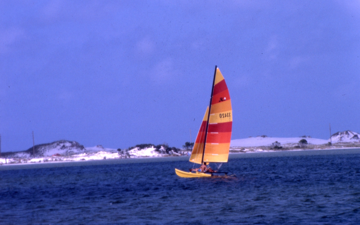 Sailing a colorful catamaran on a sunny day - Choctawhatchee Bay, Florida