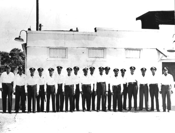 Group portrait of the first black police officers hired by the Miami Police Department - Miami, Florida.