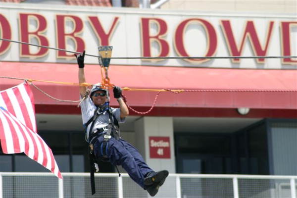 Lt. Judi Davison of the Tallahassee Fire Department Urban Search and Rescue Team performing technical level rope rescue training at Doak Campbell Stadium.