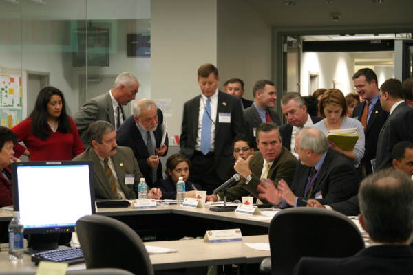 Governor Jeb Bush talking with Florida Division of Emergency Management Director W. Craig Fugate during Hurricane Charley media briefing - Tallahassee, Florida.