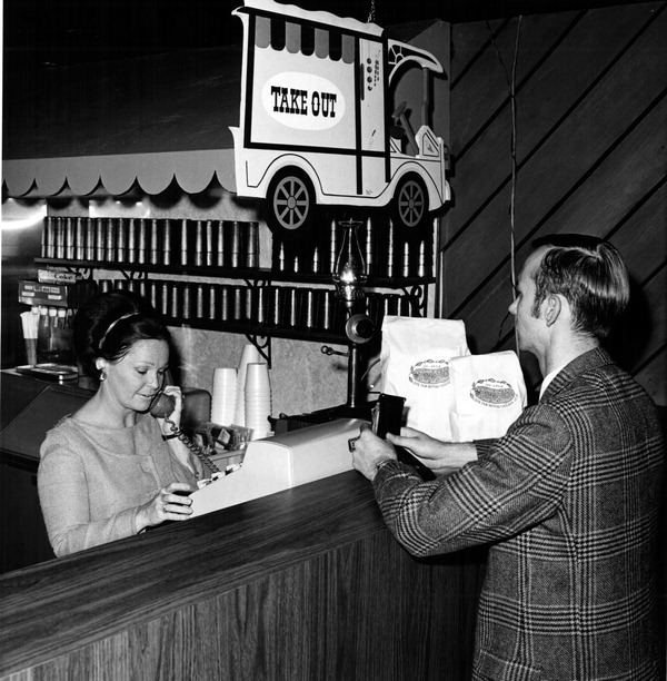 Customer at the register of the Purple Pickle - Boca Raton, Florida.