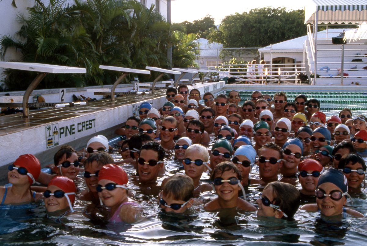 Group portrait of the Pine Crest School swim team in the water - Fort Lauderdale, Florida