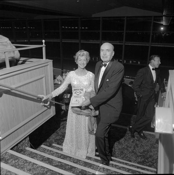 Portrait of an unidentified couple at Pompano Park horse race track - Pompano Beach, Florida