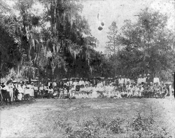 Group portrait of people at reunion.
