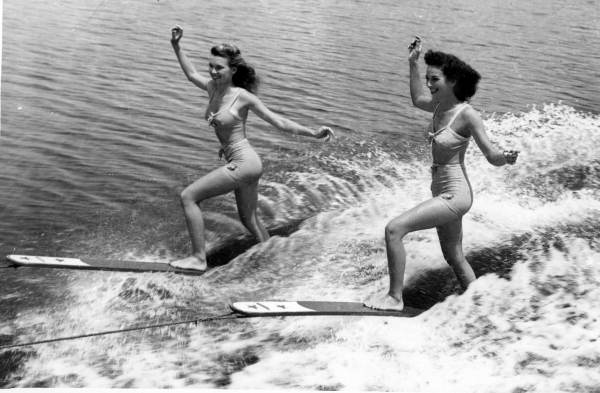 Women water skiers performing at the Cypress Gardens theme park in Winter Haven, Florida.