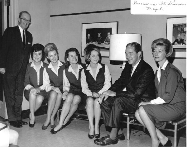 Florida Governor Haydon Burns sitting with women at the Florida Showcase in New York City.