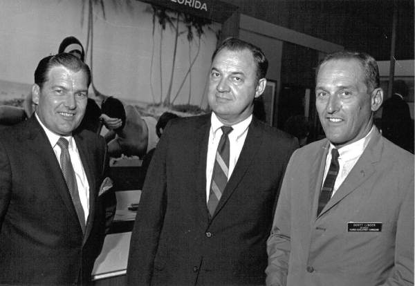 Florida Governor Claude Kirk, center, with men at the Florida Showcase in New York City.