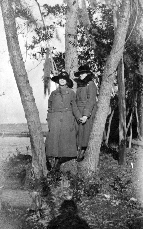 Two members of the Kaszer family on the bank of Lake Ariana in Auburndale, Florida.
