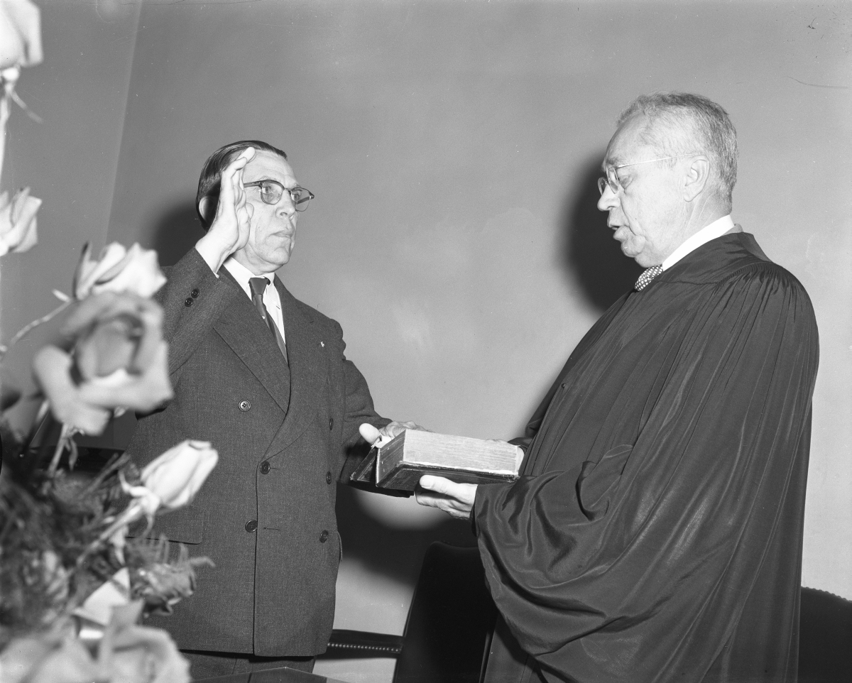 James T. Vocelle taking oath from Justice Elwyn Thomas