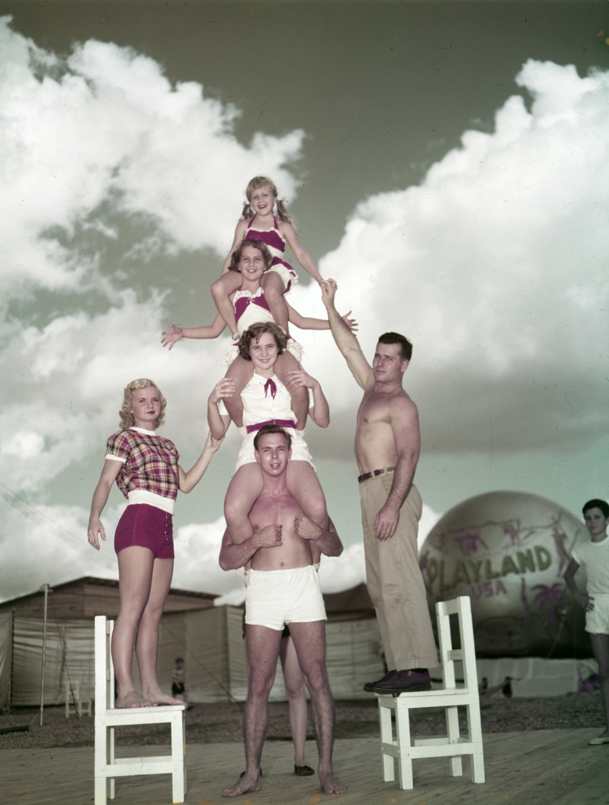 Gymnasts posed in a formation