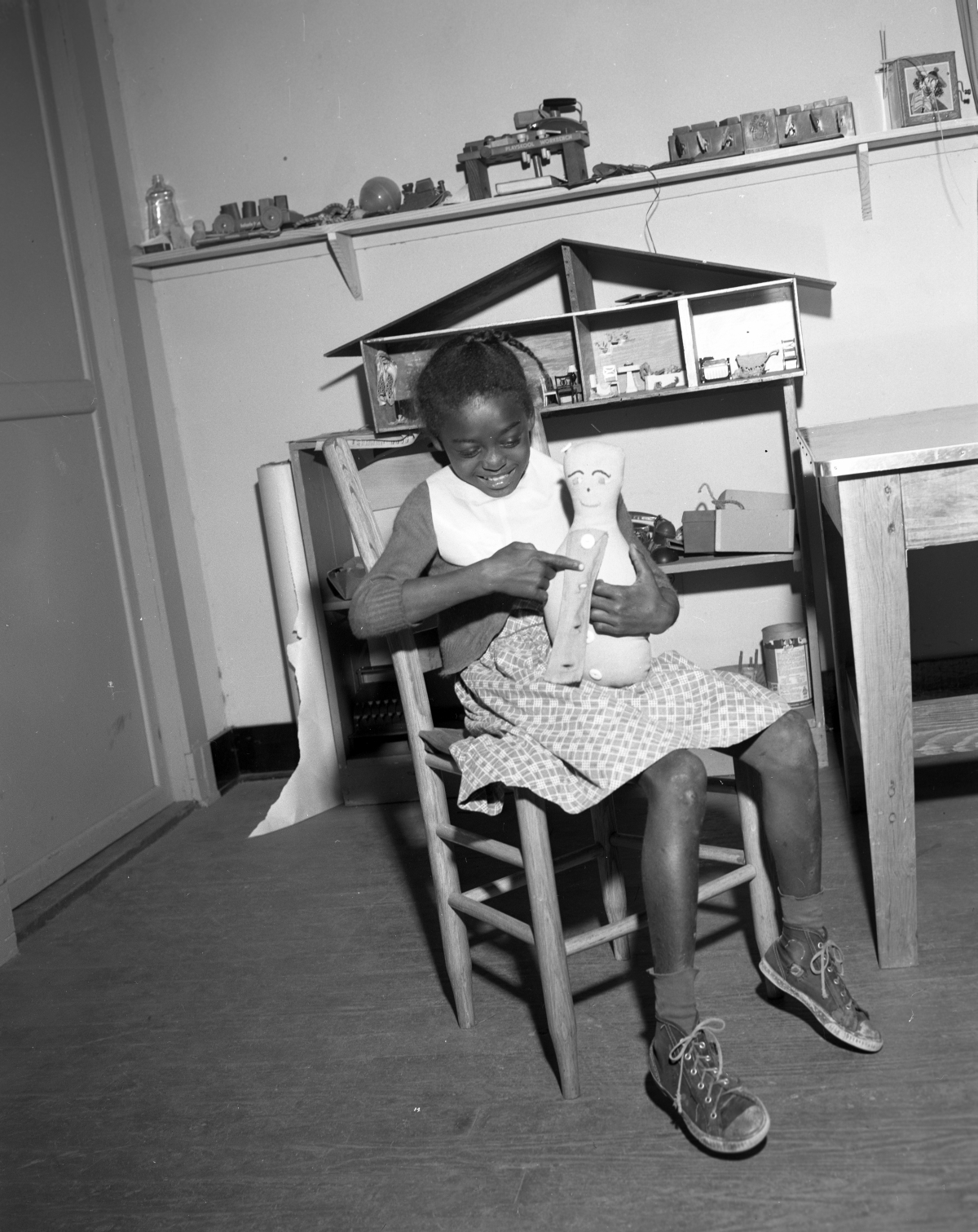 Girl playing in the toy room in the Easter Seal Therapy Center.