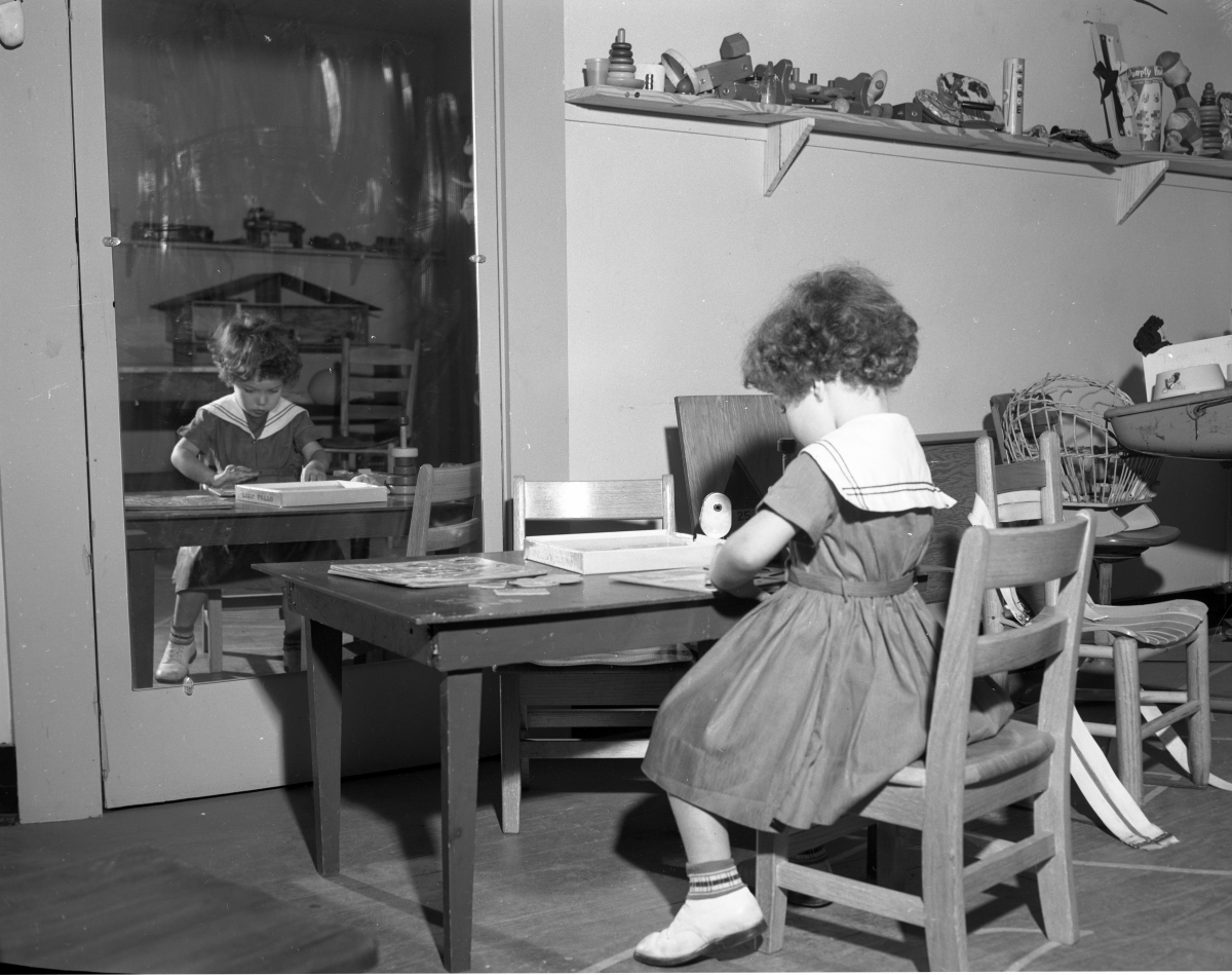Girl playing in the toy room in the Easter Seal Therapy Center.