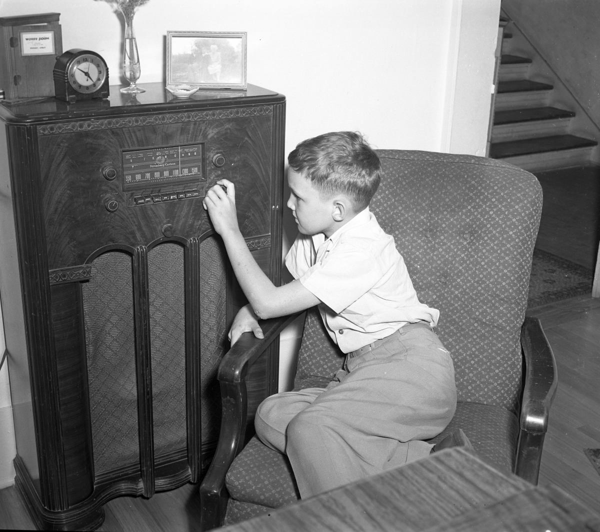 Ryan Edwards adjusting the radio.
