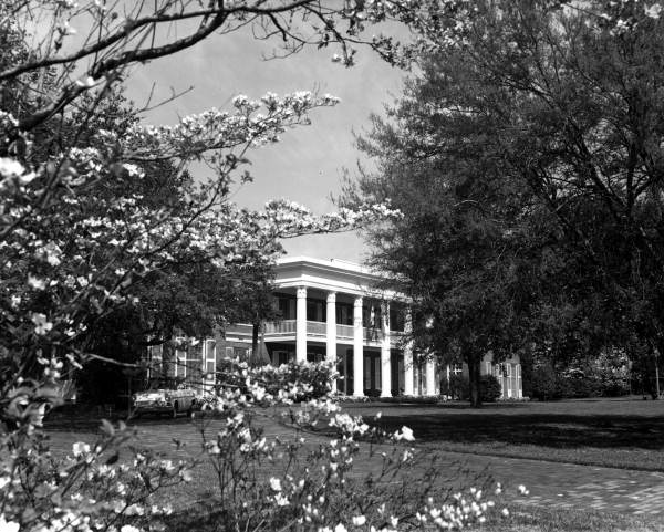 View of the Florida Governor's Mansion seen through trees - Tallahassee, Florida.