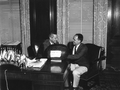 Governor Collins and unidentified man with the Leesburg Festival prize winning watermelon - Tallahassee, Florida.