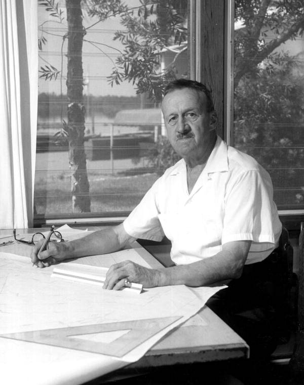 Golf course architect John R. Van Kleek in his office at the Port Paradise Hotel - Crystal River, Florida