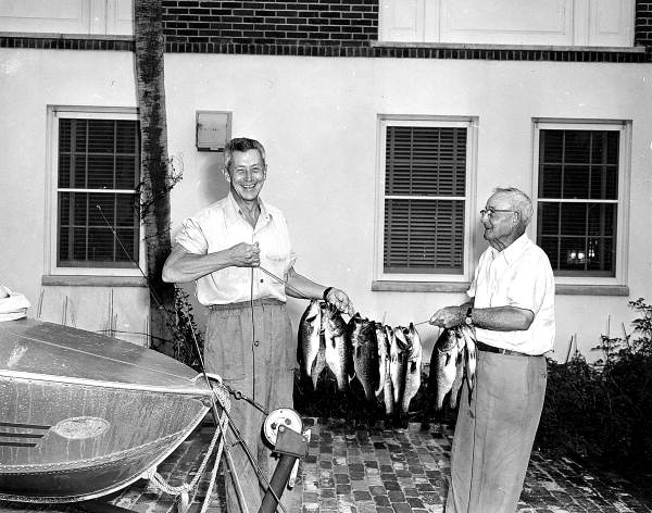 Governor LeRoy Collins and his father hold up their catch of black bass - Tallahassee, Florida.