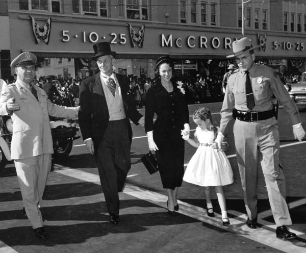 Governor Collins with wife and daughter being escorted to reviewing stand for inaugural parade - Tallahassee, Florida.