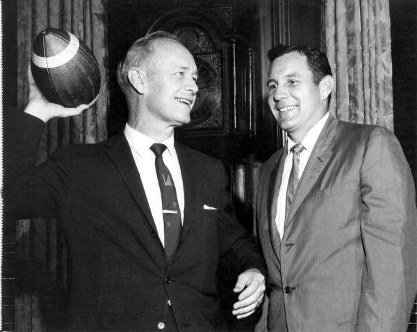 Governor Farris Bryant getting tips from FSU football coach Bill Peterson - Tallahassee, Florida.
