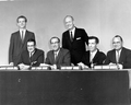 Governor Farris Bryant standing by members of the press