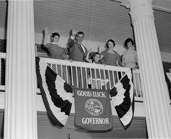 Governor LeRoy Collins and wife with their daughters waving from the Governor's Mansion - Tallahassee, Florida.