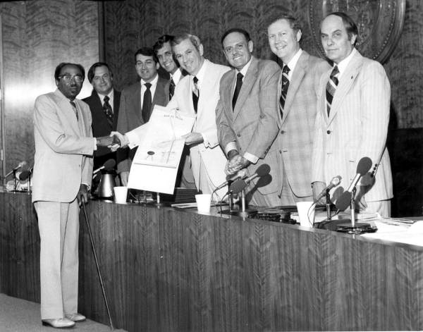 Florida's 37th Governor Reubin Askew presenting a cabinet resolution to Reverend C.K. Steele - Tallahassee, Florida.