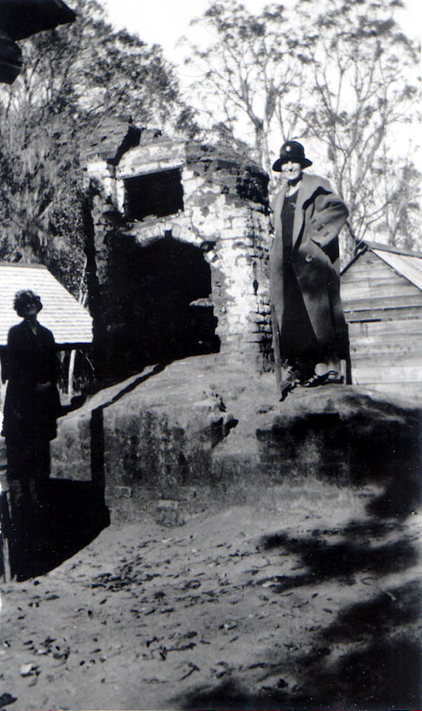 Women standing by outdoor oven at the El Destino Plantation - Jefferson County, Florida