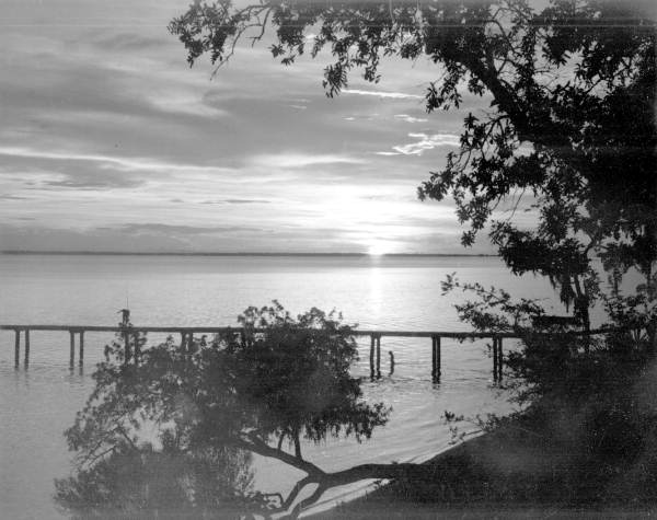A scenic view of sunset at bay