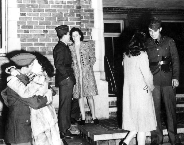 Couples saying goodnight in front of FSCW's Bryan Hall - Tallahassee, Florida.