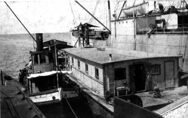 Loading phosphate from barges - Port Inglis, Florida