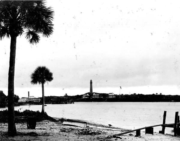 View of lighthouse and steamers from across the inlet - Jupiter Inlet, Florida.