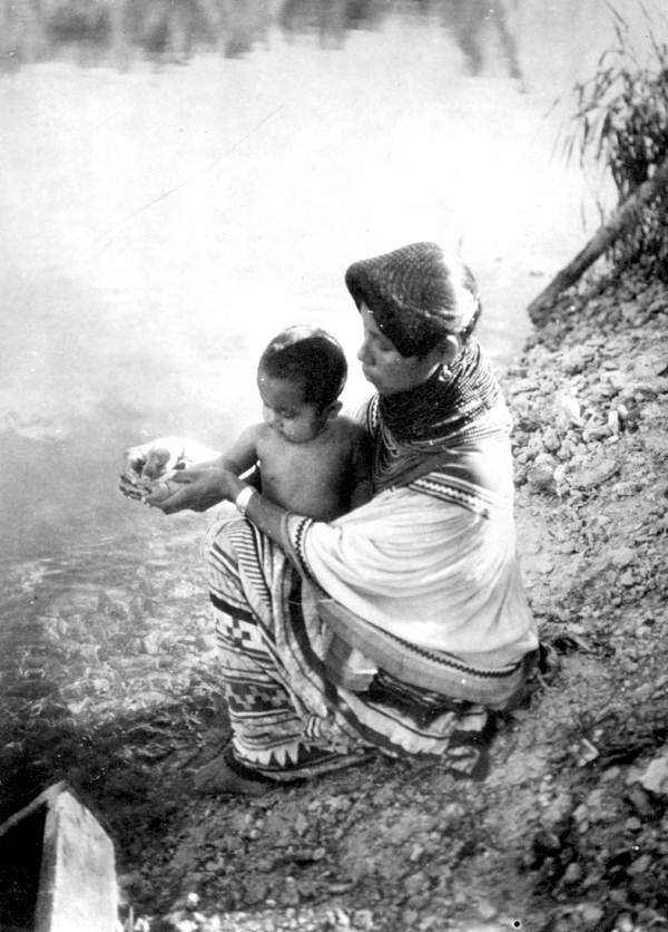 Ruby Tommie with child at Big Cypress Seminole Indian Reservation