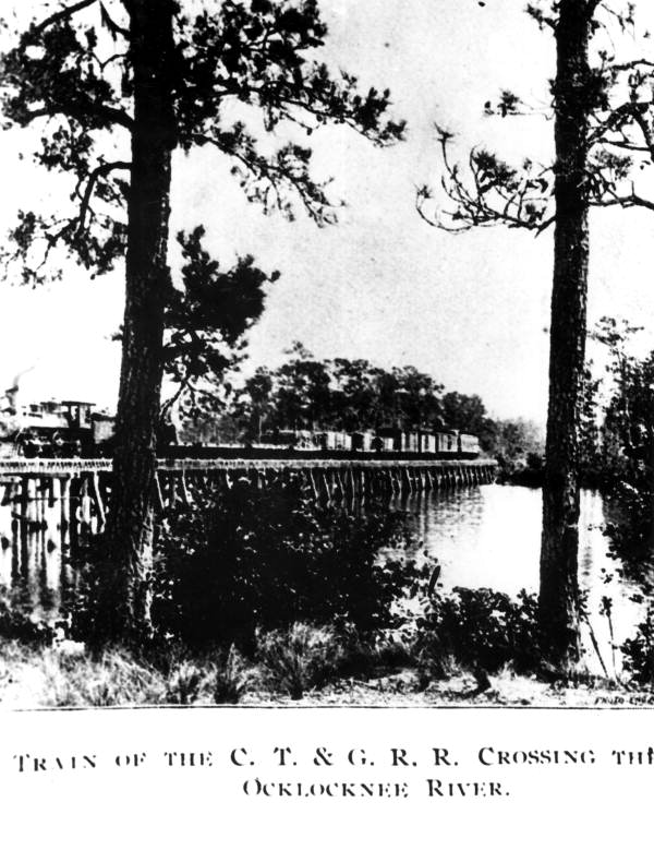 Carrabelle, Tallahassee & Georgia Railroad train crossing the Ocklocknee River bridge