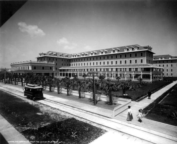 Horse-drawn railway car passing by the Breakers hotel - Palm Beach, Florida.