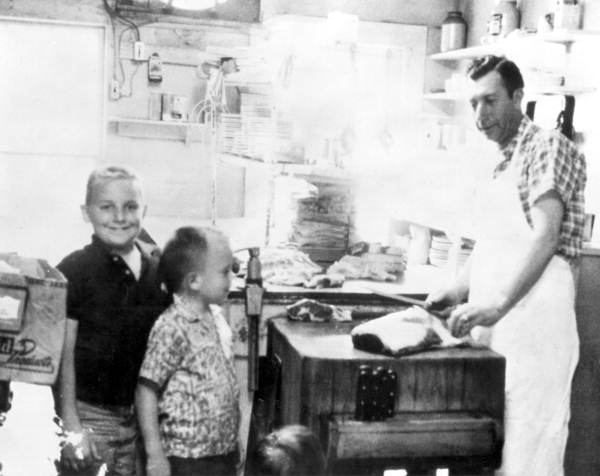 Kalfas brothers with their grandfather in the kitchen - Tallahassee, Florida.