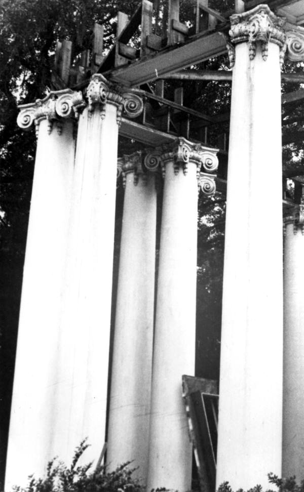 View of cracked and stained porch columns after demolition had begun - Tallahassee, Florida.