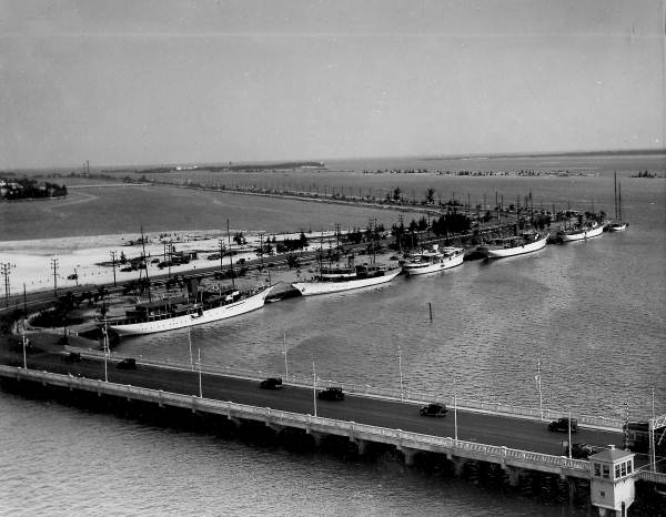 Yachts tied up alongside County Causeway - Miami Beach, Florida.
