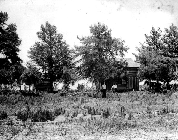 Men standing outside residence - Kissimmee, Florida