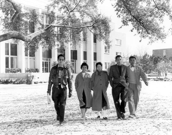 Florida State University students walking in the snow by the library - Tallahassee, Florida.