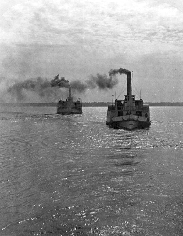 Two steamboats travelling on the waterway - Florida