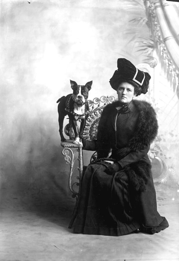 Woman posing for a portrait with her dog - Pensacola, Florida.