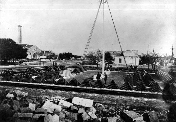 Cannon balls stacked neatly in little pyramidal structures - Pensacola, Florida.