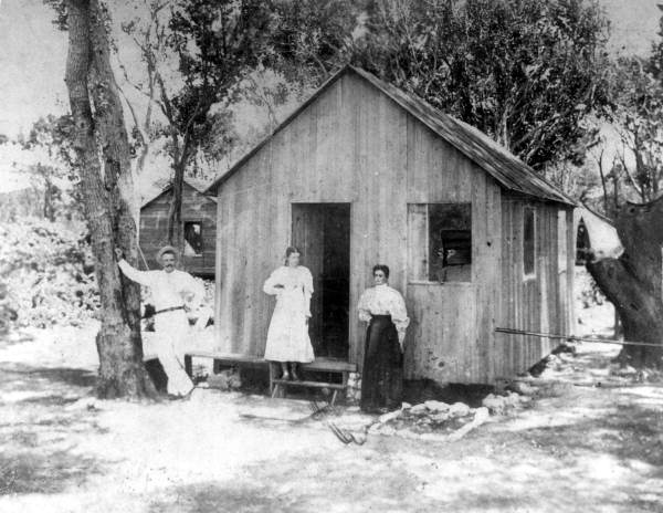 Family outside their home - Miami, Florida.