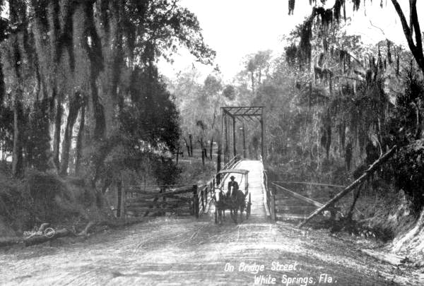 Horse drawn vehicle crossing bridge - White Springs, Florida